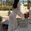 S3ce5568f88bb49e59dd491167be2cfe1A.webp Yiiciovy Sexy Women Long Knit Beach Dress Hollow-Out Deep V-Neck Long Sleeve Bikini Cover-Ups Dress Fall Backless Holiday Dress