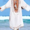 S52c103405db348a3b369a76c94c1760cZ.webp Beach Wear Beachwear Female Women Colorful Half Sleeve Backless Crochet Knitted Tunic Beach Cover Up Cover-ups Beach Dress V7537