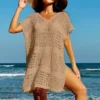 S5c486381d0f441a5a261d38d8d6cf2dab.webp Knitting V-Neck Sexy Hollow Out Beach Bikini Cover-Ups Ladies Summer Vacation Casual Loose Beachwear Sunscreen Smock