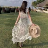 S6c137dc3f3bb491b8771ec6db25ff413G.webp Crochet Beach Dress Lace Women Summer Seaside Bikini Cover Up Oversize Sexy Sleeveless Hollow Out Front Short Back Long