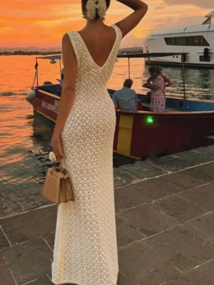Sc5ee21a95c914f368d10eb1ef6156214A.webp Solid Color Hollow Knitted Beach Vacation Dress Elegant Sleeveless Skinny Cover-up Dress Women Sexy Perspective Swimwear Dress