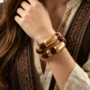 Women's Amber Tone Beaded Jewelry Set with Gold Tone Charms - Statement Necklace And Stackable Bracelets for Everyday Use