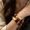 Women's Amber Tone Beaded Jewelry Set with Gold Tone Charms - Statement Necklace And Stackable Bracelets for Everyday Use