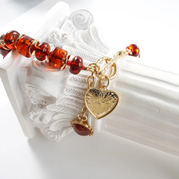 Women's Amber Tone Beaded Jewelry Set with Gold Tone Charms - Statement Necklace And Stackable Bracelets for Everyday Use